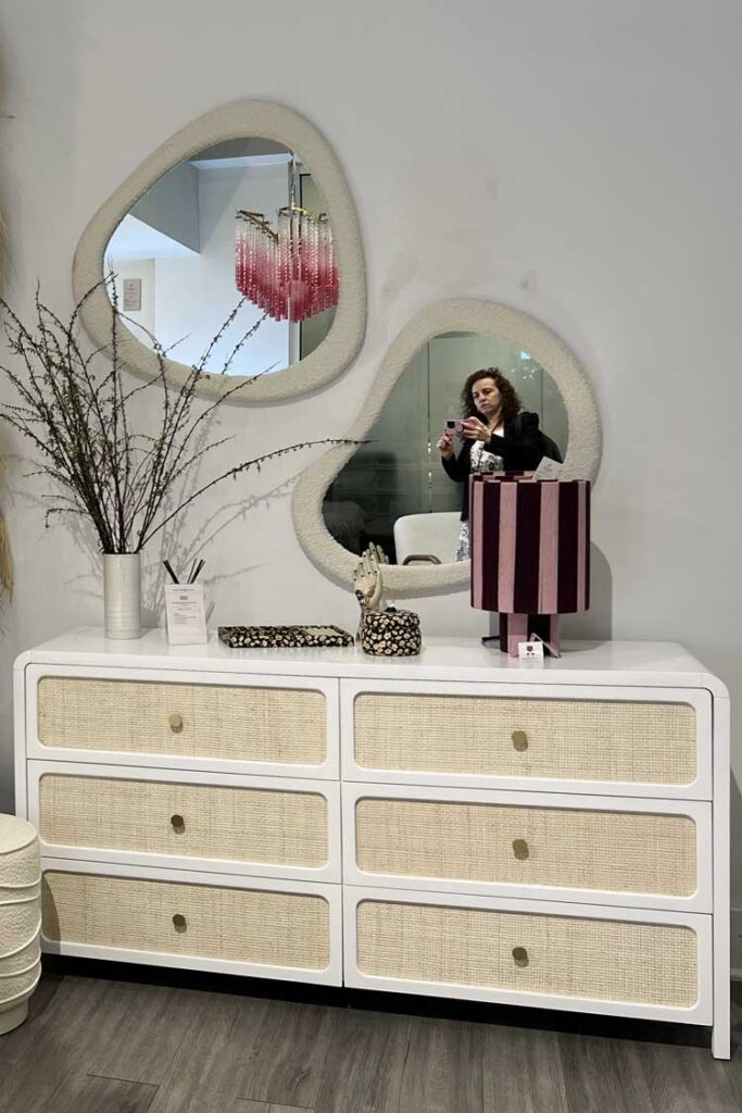 white dresser with raffial drawers