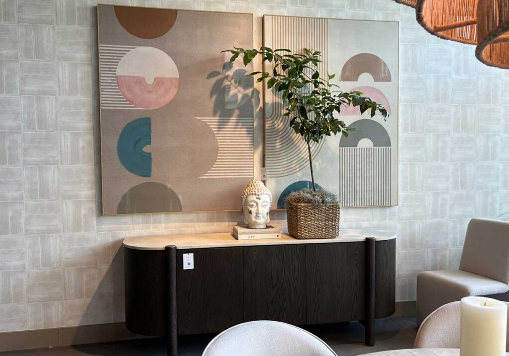 large artwork over dining room cabinet