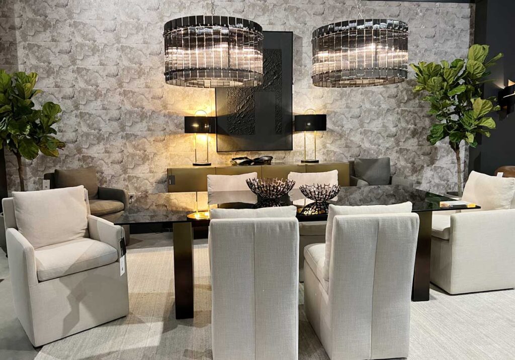two chandeliers over dining table