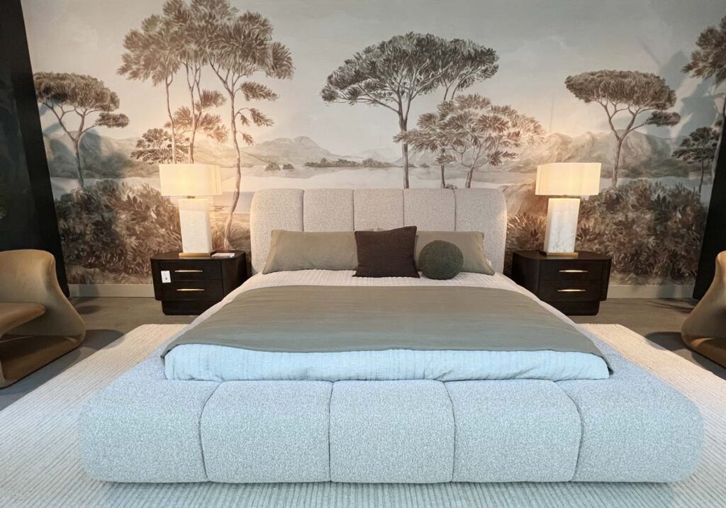 upholstered bed with wallpaper