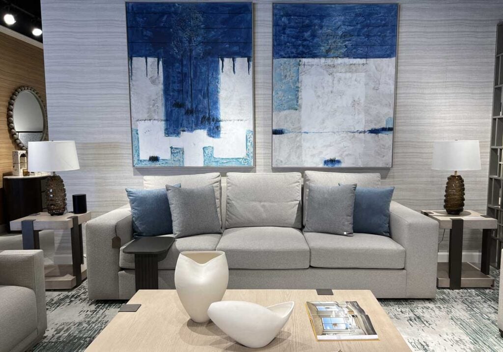 blue artwork over grey sofa