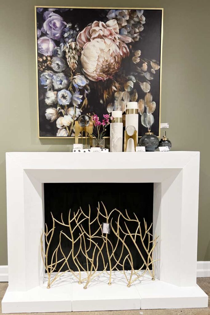 artwork over fireplace mantel