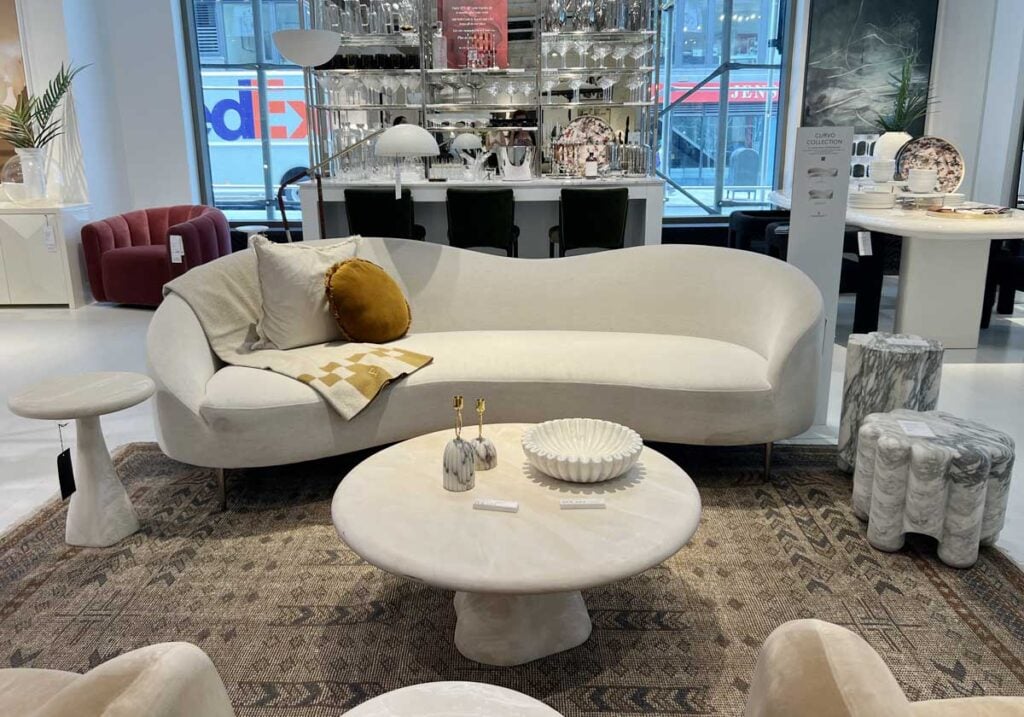 curvo sofa with marble tables home decor trends 2025