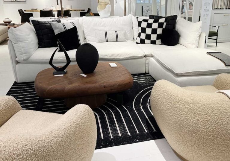 white sectional with black decor