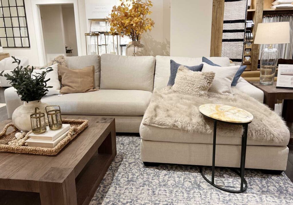 big sur sectional sofa with blue pillows