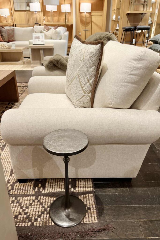 iron metal drink table next to chair pottery barn fall decor