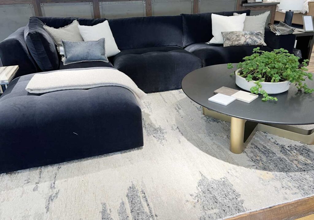 navy velvet sectional sofa with pillows