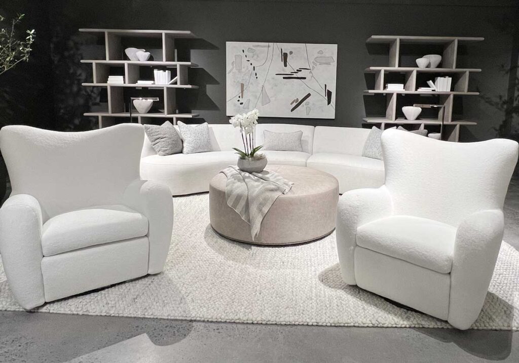 neutral designer living room with bookcases quiet luxury interior design