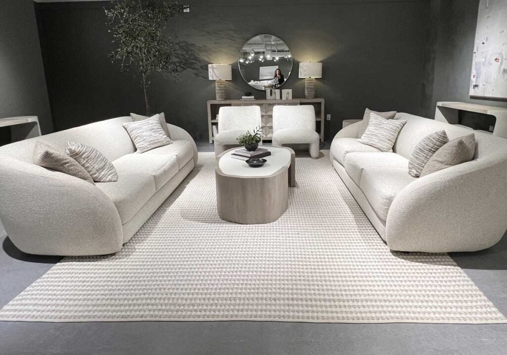 two curved sofas living room quiet luxury interior design