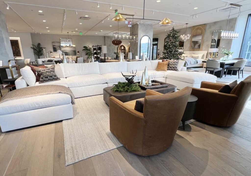 white sectional with accent chairs