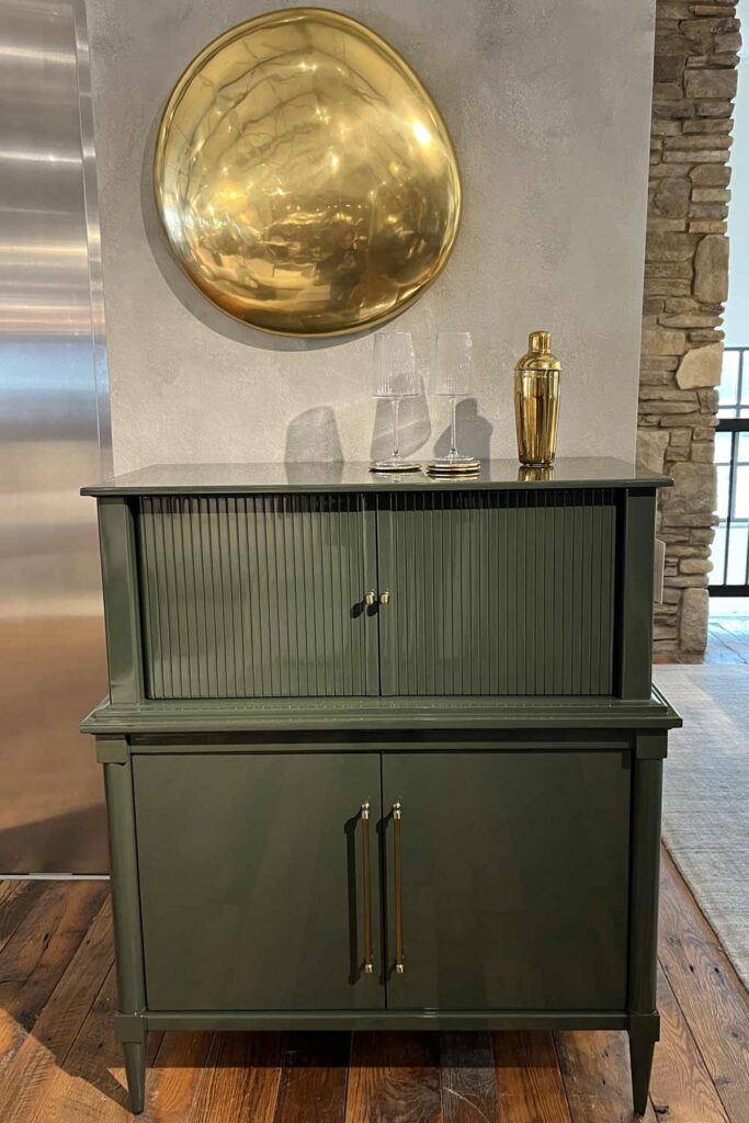 green bar cabinet with gold wall decor arhaus decorating ideas