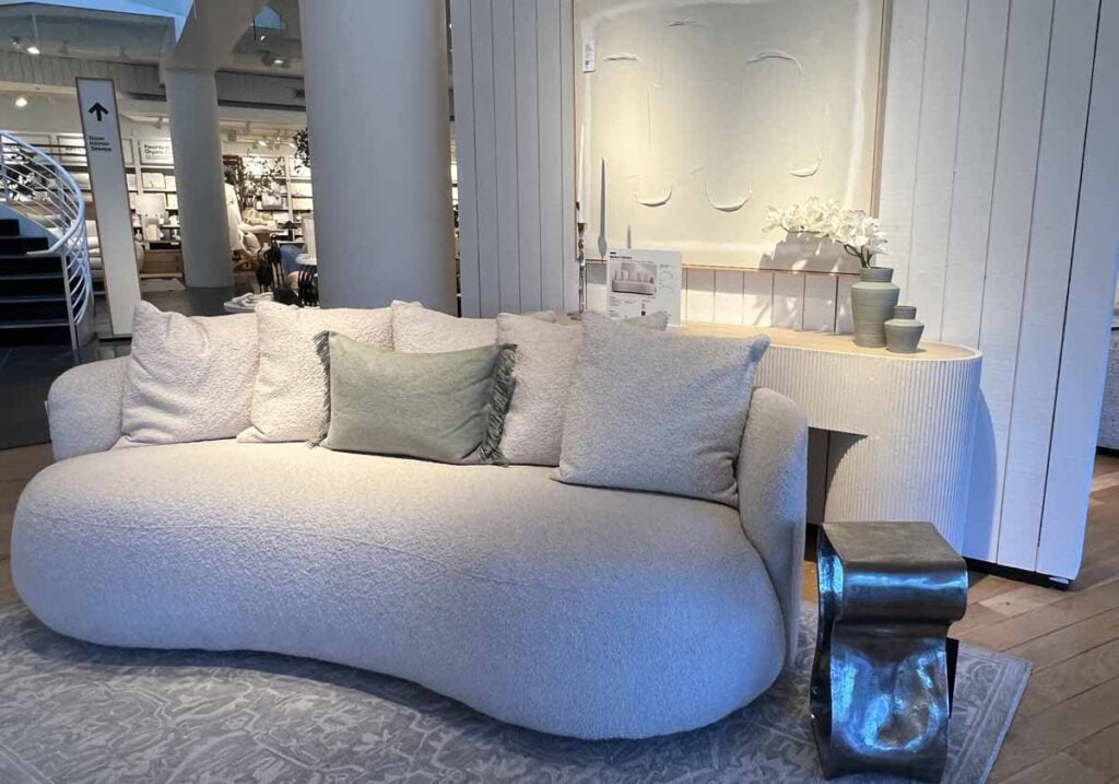 arhaus curved boucle sofa